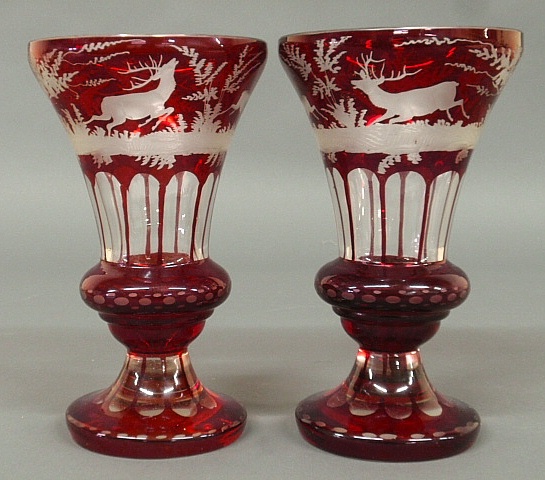 Appraisal: - Pair of red Bohemia glass vases with stag and