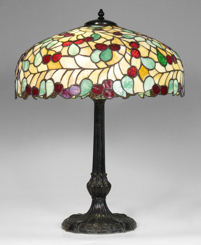 Appraisal: CHICAGO MOSAIC STAINED GLASS LAMP Black painted cast metal base