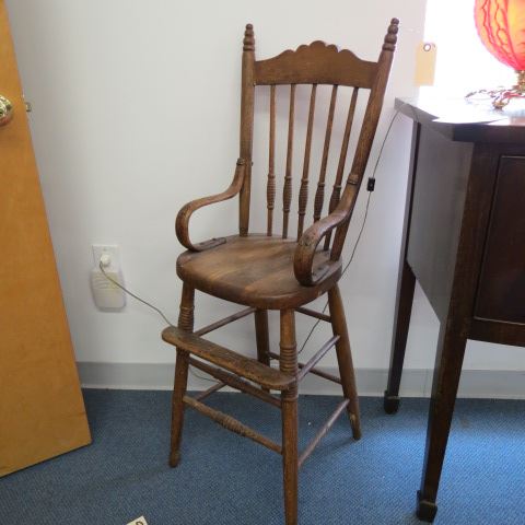 Appraisal: Antique Oak High Chair carved spindles circa tall