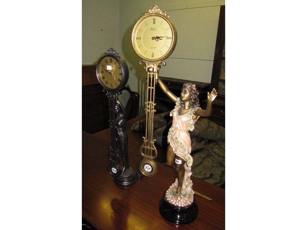 Appraisal: Lot comprising two figural mantle clocks