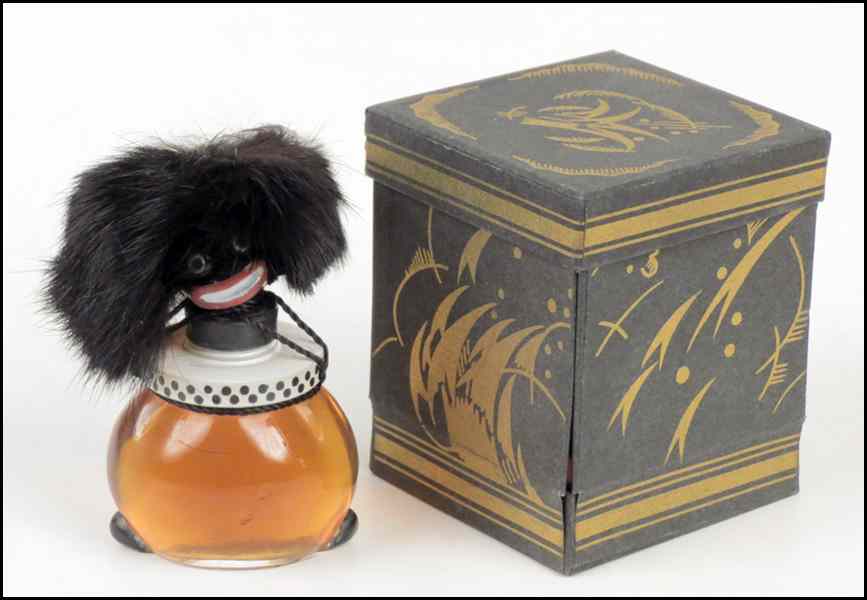 Appraisal: GOLLIWOGG FOR VIGNY PERFUME BOTTLE With original box Condition No