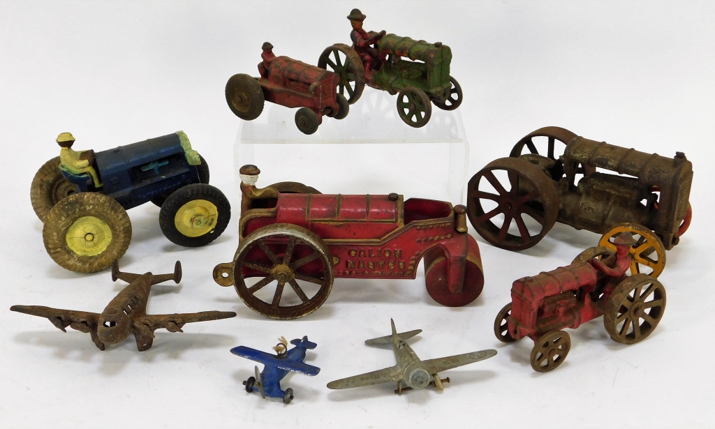 Appraisal: PC ARCADE CAST IRON TRACTORS AND PLANE GROUP United States