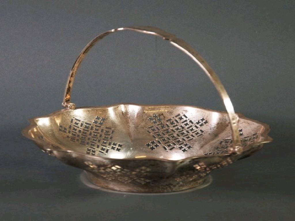 Appraisal: GEORGE V PIERCED SILVER SWING HANDLE CAKE BASKET by Charles