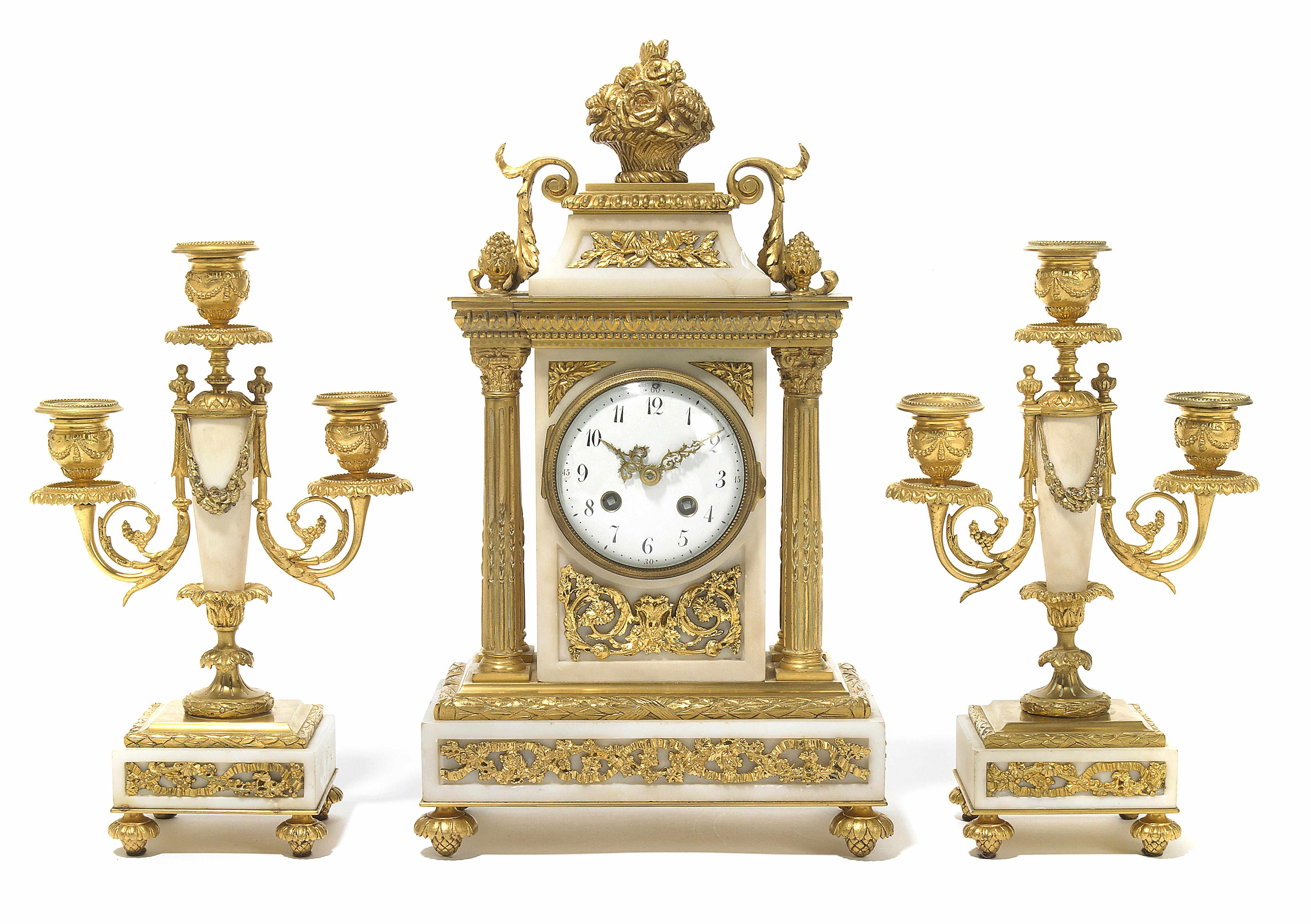 Appraisal: A Louis XVI style gilt bronze and marble clock garniture