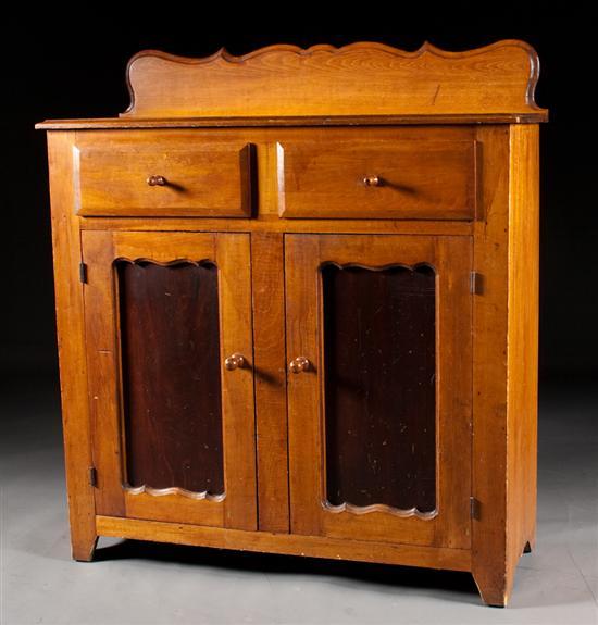 Appraisal: American vernacular carved pine jelly cupboard Mid-Atlantic or Southern mid-