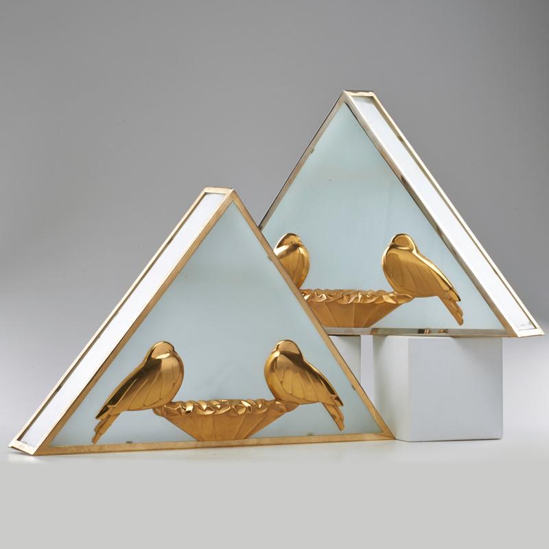 Appraisal: ART DECO Pair frosted glass sconces with patinated metal bird