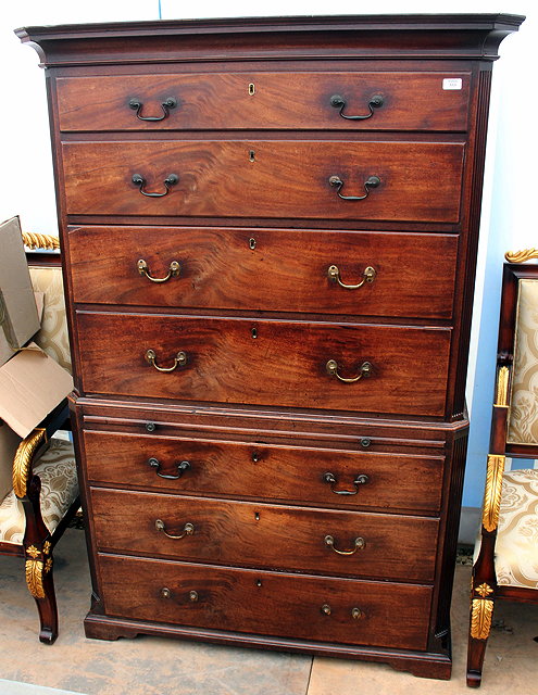 Appraisal: A GEORGIAN MAHOGANY CHEST ON CHEST the upper section with