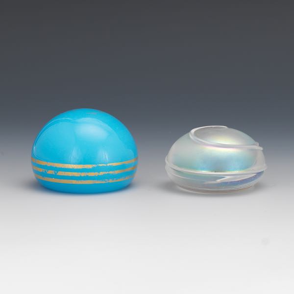 Appraisal: TWO GLASS PAPERWEIGHTS One Baccarat opaline blue paperweight with traces