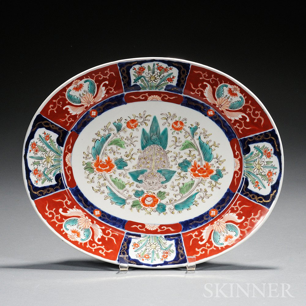 Appraisal: Imari Charger Japan the oval well decorated with a crouched