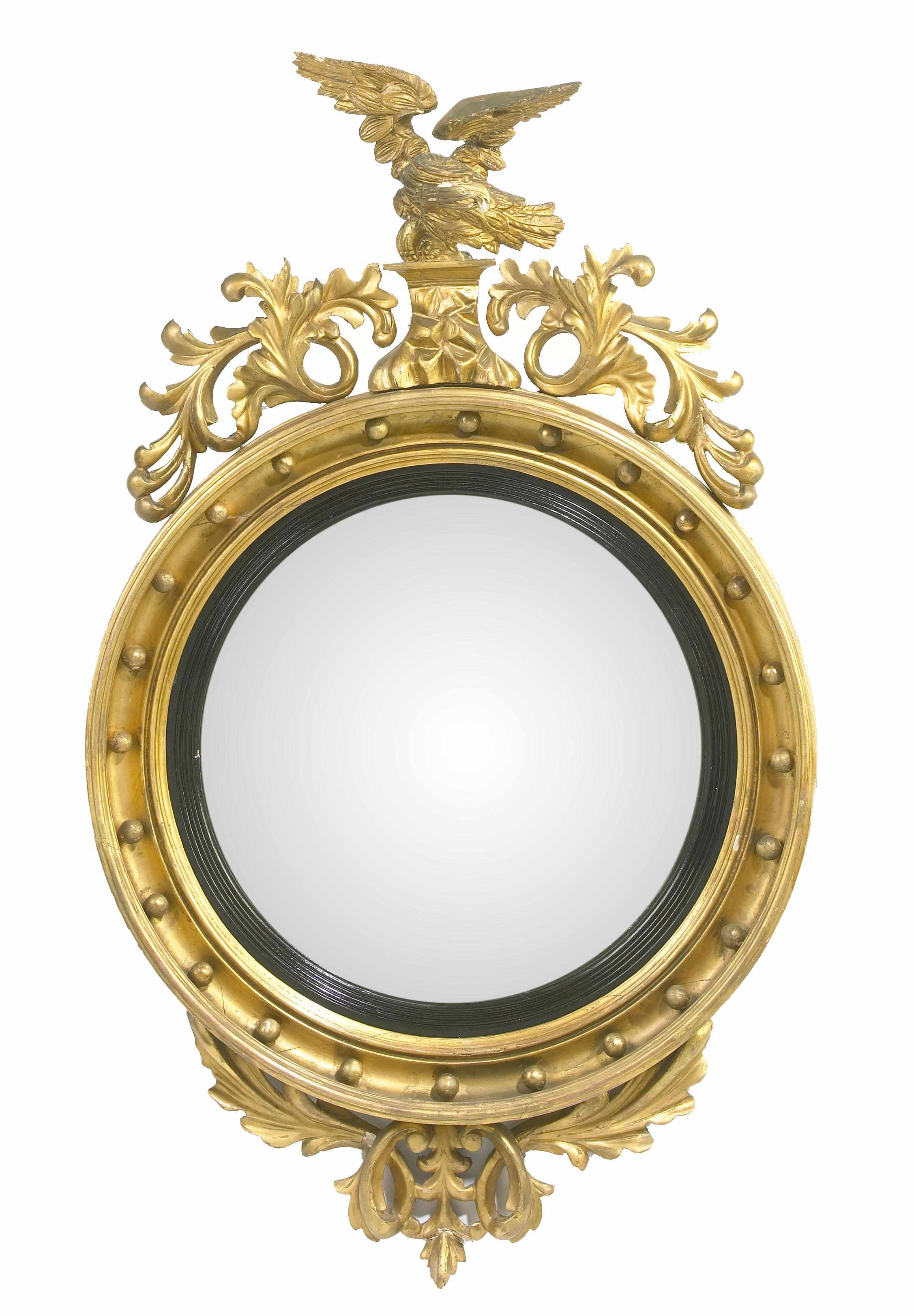 Appraisal: A Regency parcel ebonized giltwood mirror height in width in