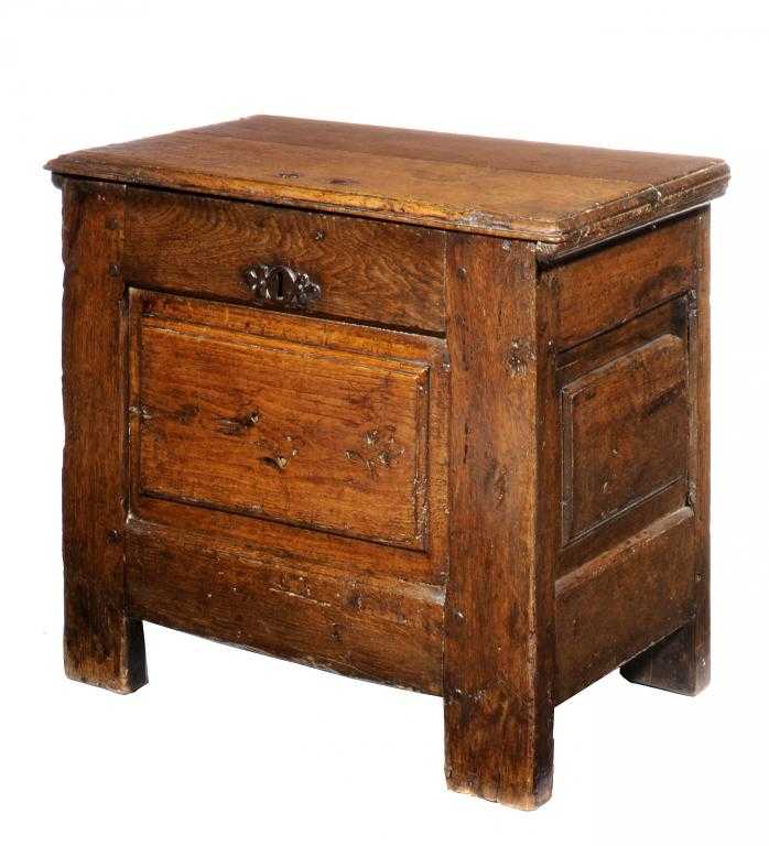 Appraisal: AN ENGLISH JOINED OAK CHEST with boarded lid and panelled