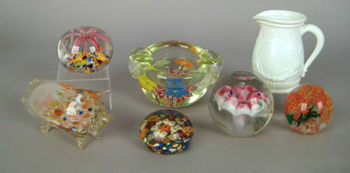 Appraisal: Six glass paperweights together with a milk glass creamer Provenance