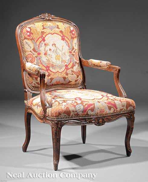 Appraisal: An Antique Louis XV-Style Carved Walnut and Needlepoint Fauteuil late