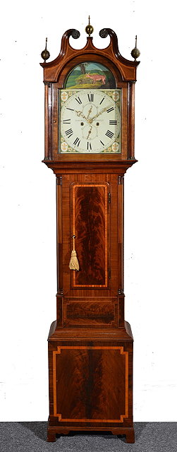 Appraisal: A mahogany eight day longcase clockthe arched painted Roman dial