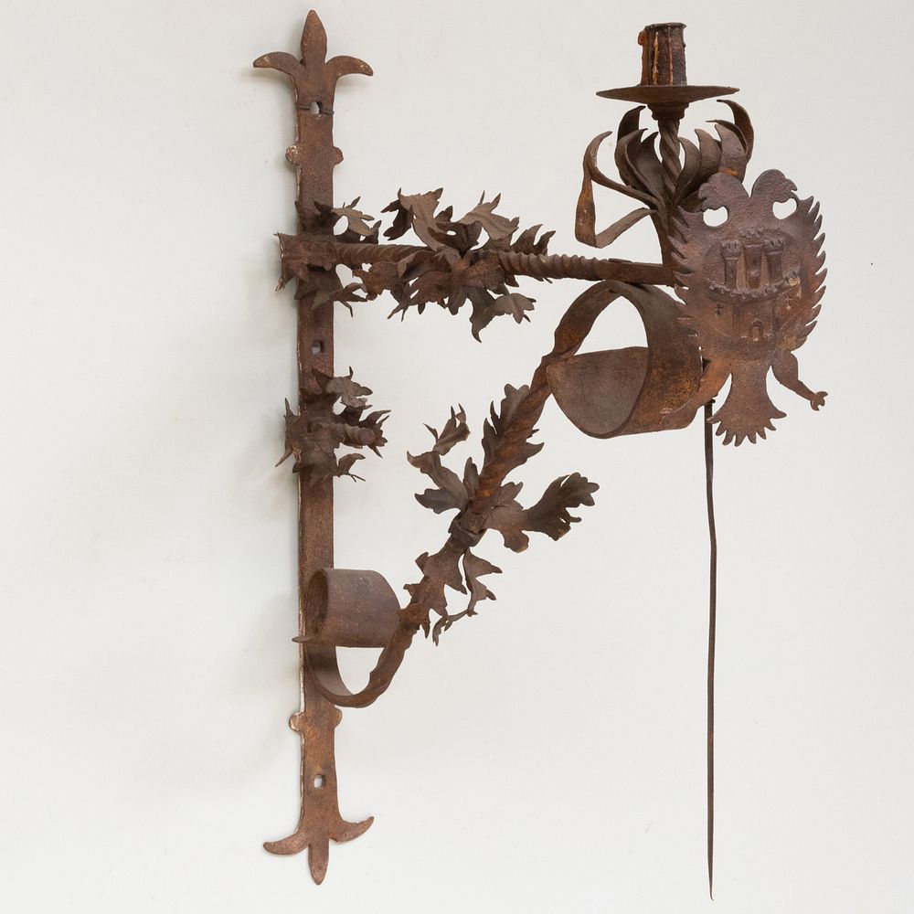 Appraisal: Spanish Baroque Wrought-Iron and Parcel-Gilt Wall Light With double-headed eagle