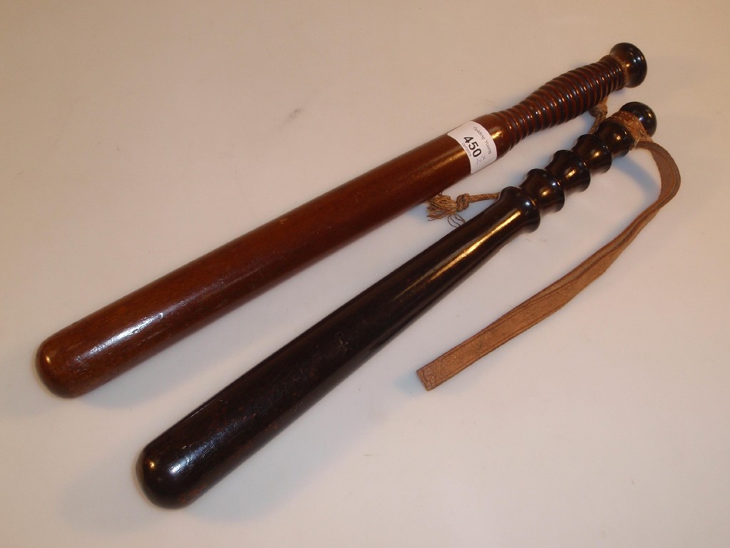 Appraisal: Two turned wood truncheons