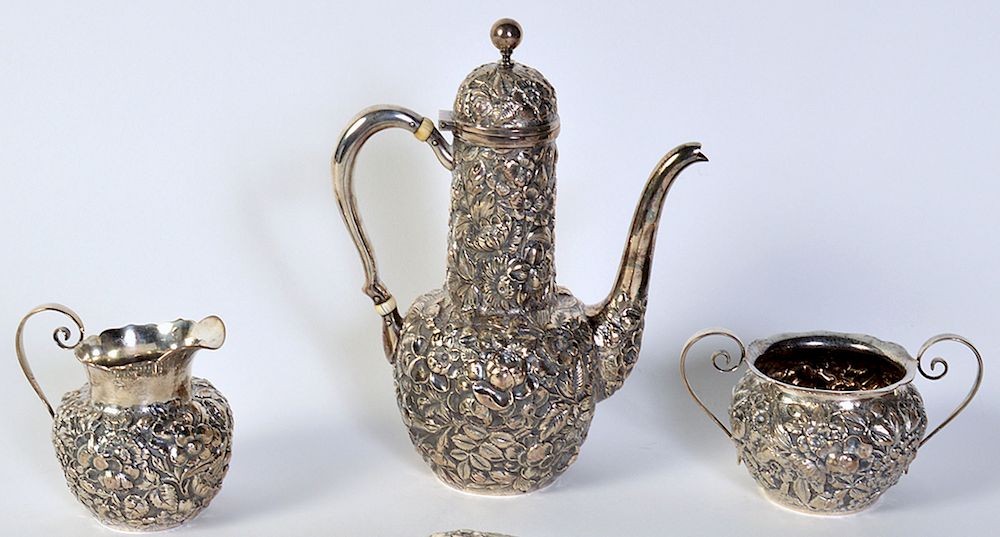 Appraisal: Sterling Pc Repousse Tea Set Overall repousse floral designs in