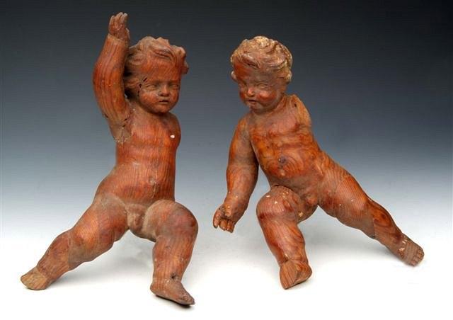 Appraisal: A PAIR OF TH CENTURY CONTINENTAL PINE CARVINGS each in