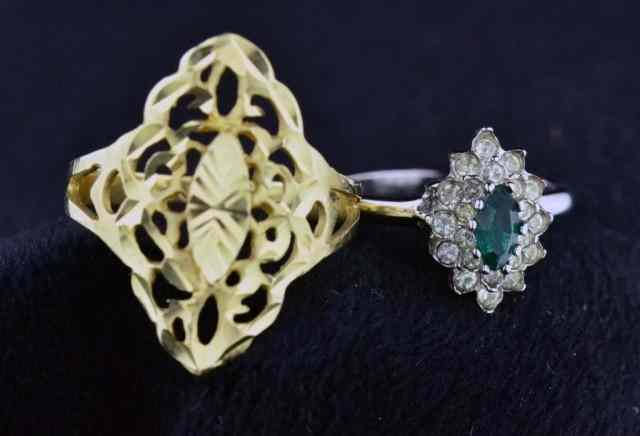 Appraisal: LADY'S GOLD FILIGREE GREEN SILVEIncluding karat yellow gold filigree ring