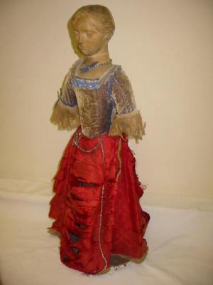 Appraisal: A th century Continental limewood standing doll with carved face