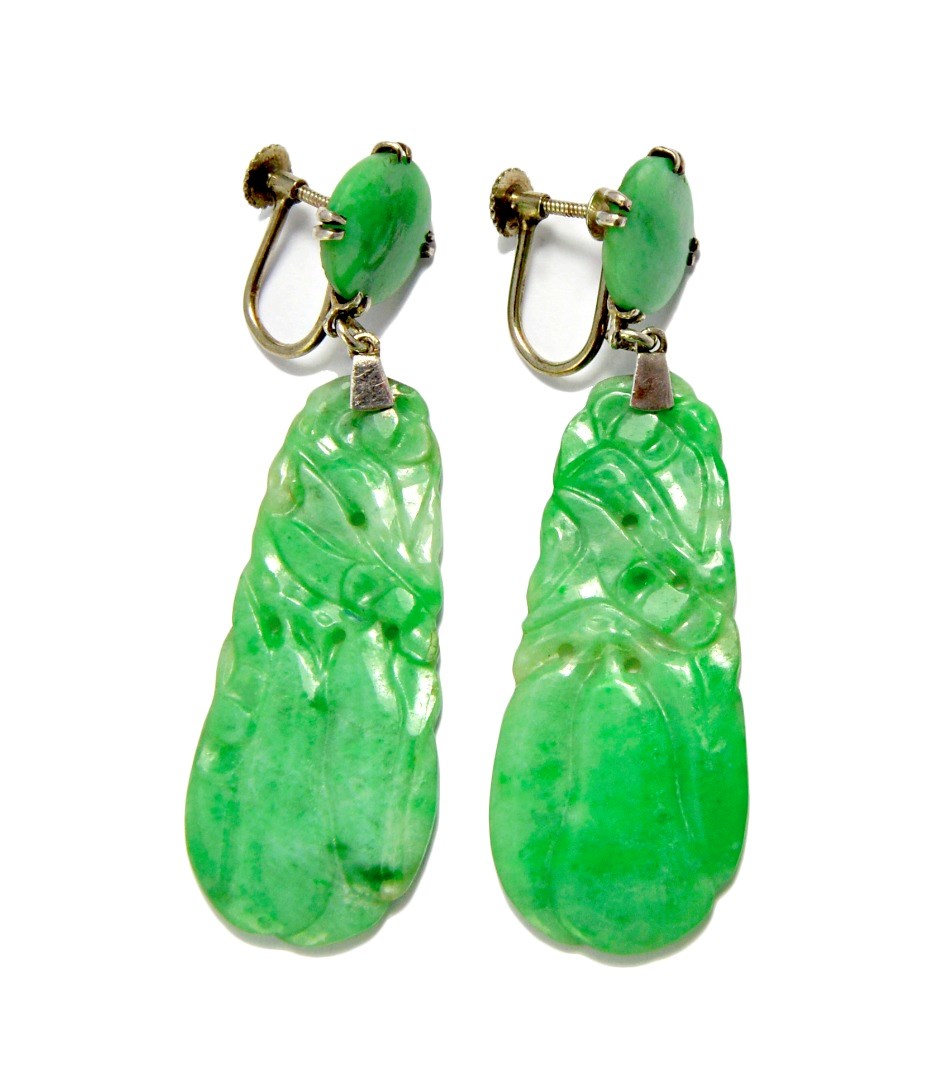 Appraisal: A pair of carved jade pendant earrings each drop of