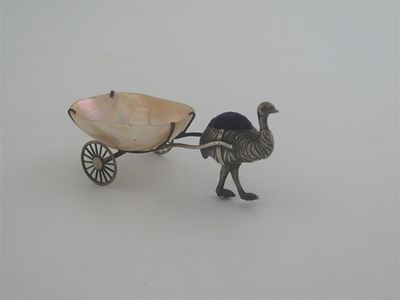 Appraisal: An emu pulling a mother of pearl cart with interesting