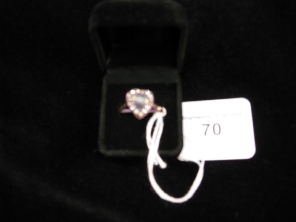 Appraisal: A Diamond and Rock Crystal Ring the heart shaped cabochon