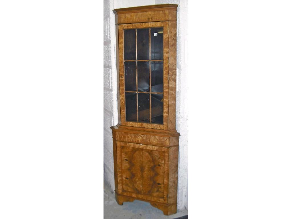 Appraisal: Attractive Georgian style yew corner cabinet the moulded top over