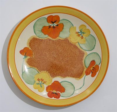 Appraisal: Nasturtium' a Clarice Cliff Bizarre plate painted in colours printed