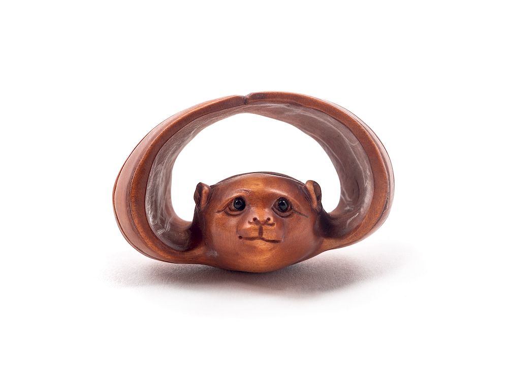 Appraisal: A Japanese Carved Boxwood Netsuke Length in cm A Japanese