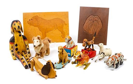 Appraisal: A Group of Eleven Dog Toys depicting Various Breeds Width