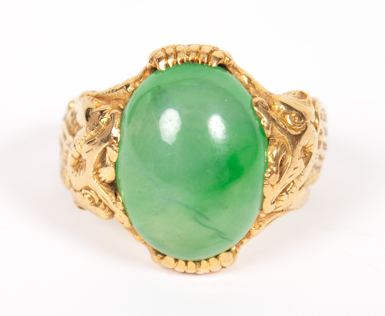 Appraisal: Gentleman's K gold and jade ring brilliant green cabochon x