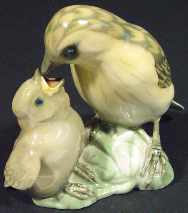 Appraisal: Bing Grundell Copenhagen china sparrow with chick with hand painted