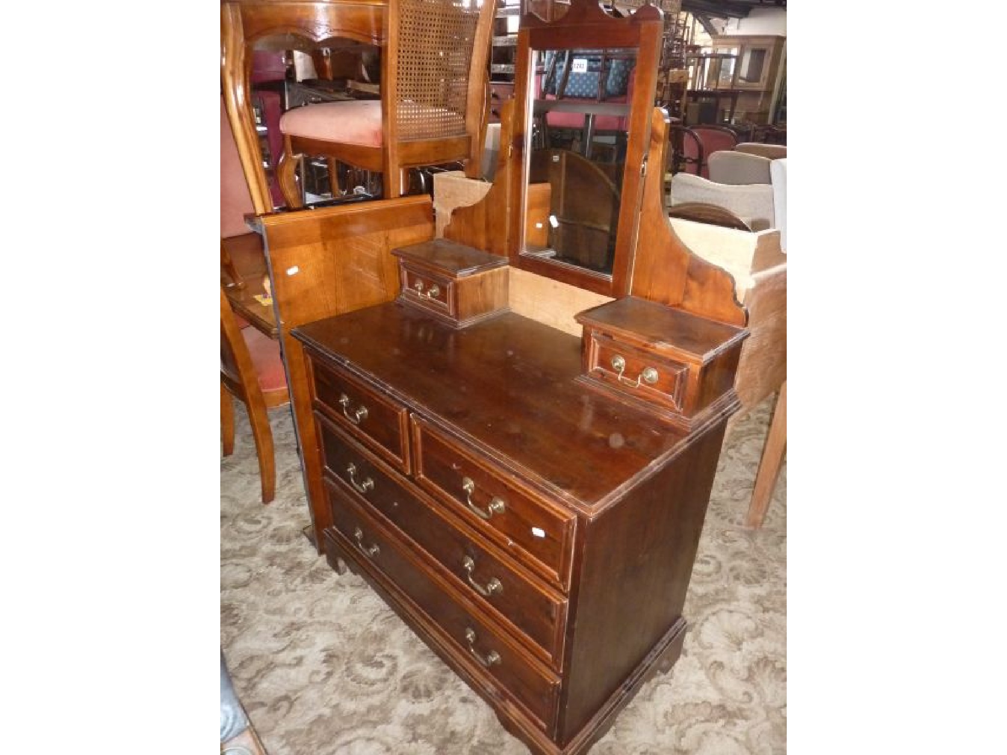 Appraisal: A pine dressing chest enclosed by two long and two