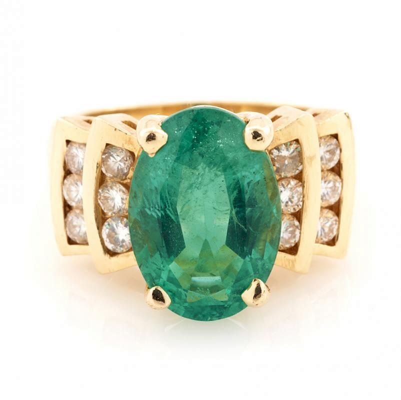 Appraisal: k Yellow gold emerald and diamond ring k Yellow gold