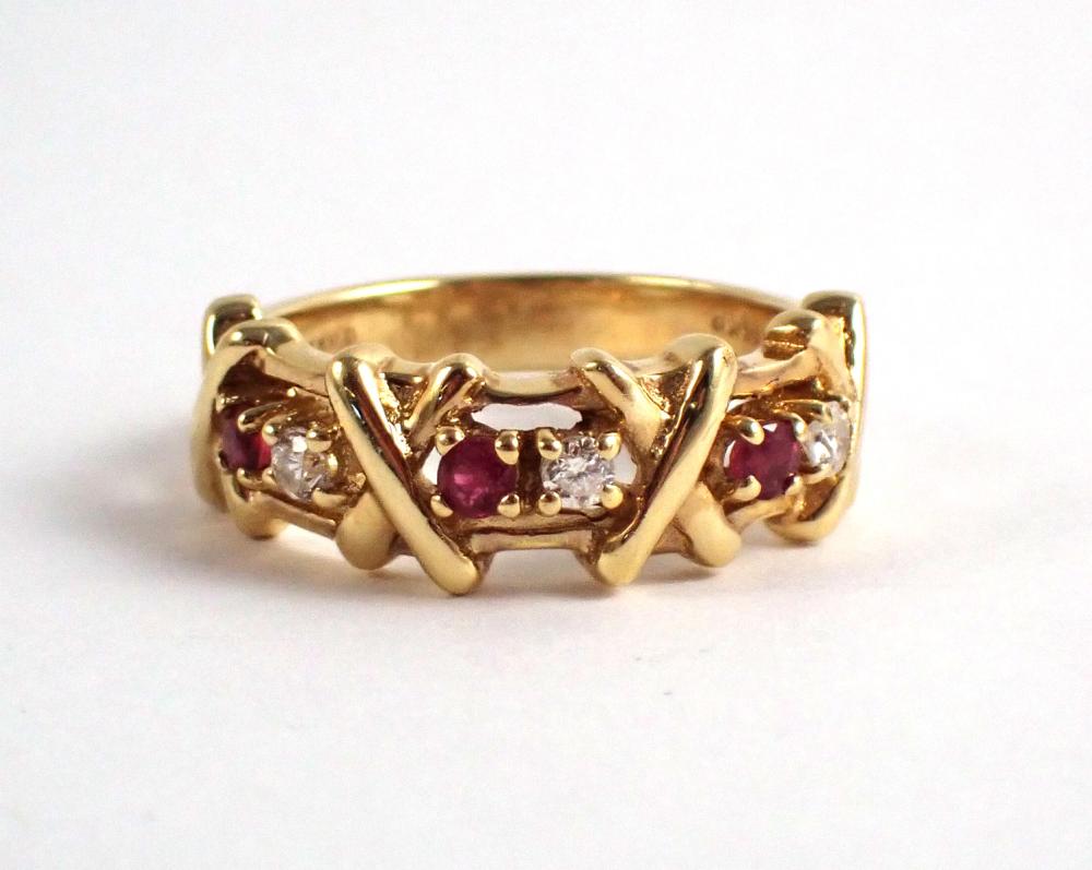 Appraisal: RUBY DIAMOND AND FOURTEEN KARAT GOLD RING with three yellow