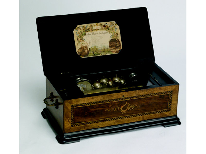 Appraisal: SWISS ORCHESTRAL CYLINDER MUSIC BOX Held in a marquetry decorated