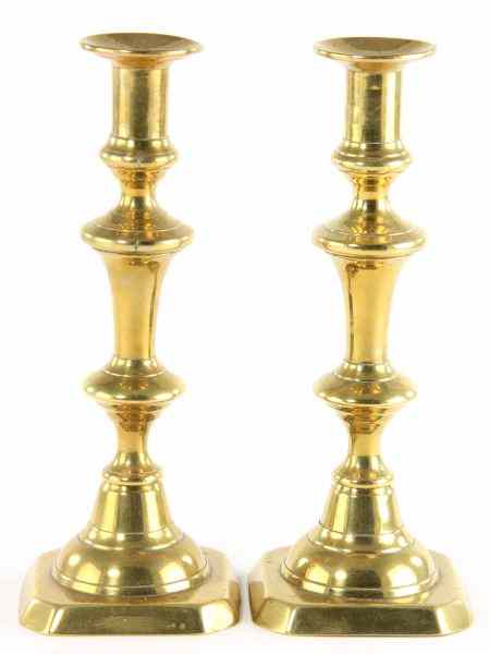 Appraisal: Pair of Brass Push Up Candlesticks th century baluster turned