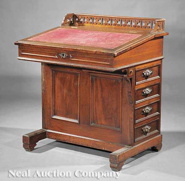 Appraisal: An American Carved Walnut Davenport Desk mid- th c reticulated