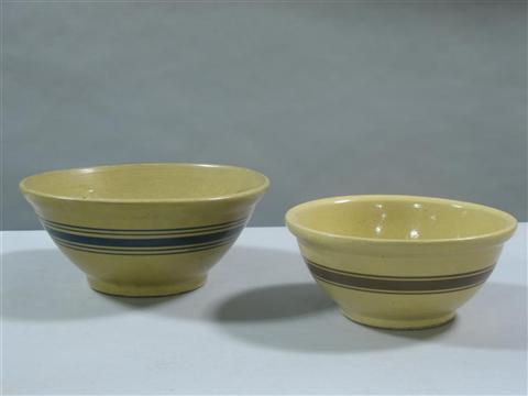 Appraisal: YELLOW WARE BOWL Painted with blue stripes dia in the