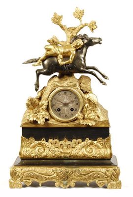 Appraisal: A th century French gilt brass and patinated mantel clock