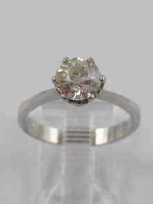 Appraisal: A white metal tests ct gold diamond solitaire ring estimated