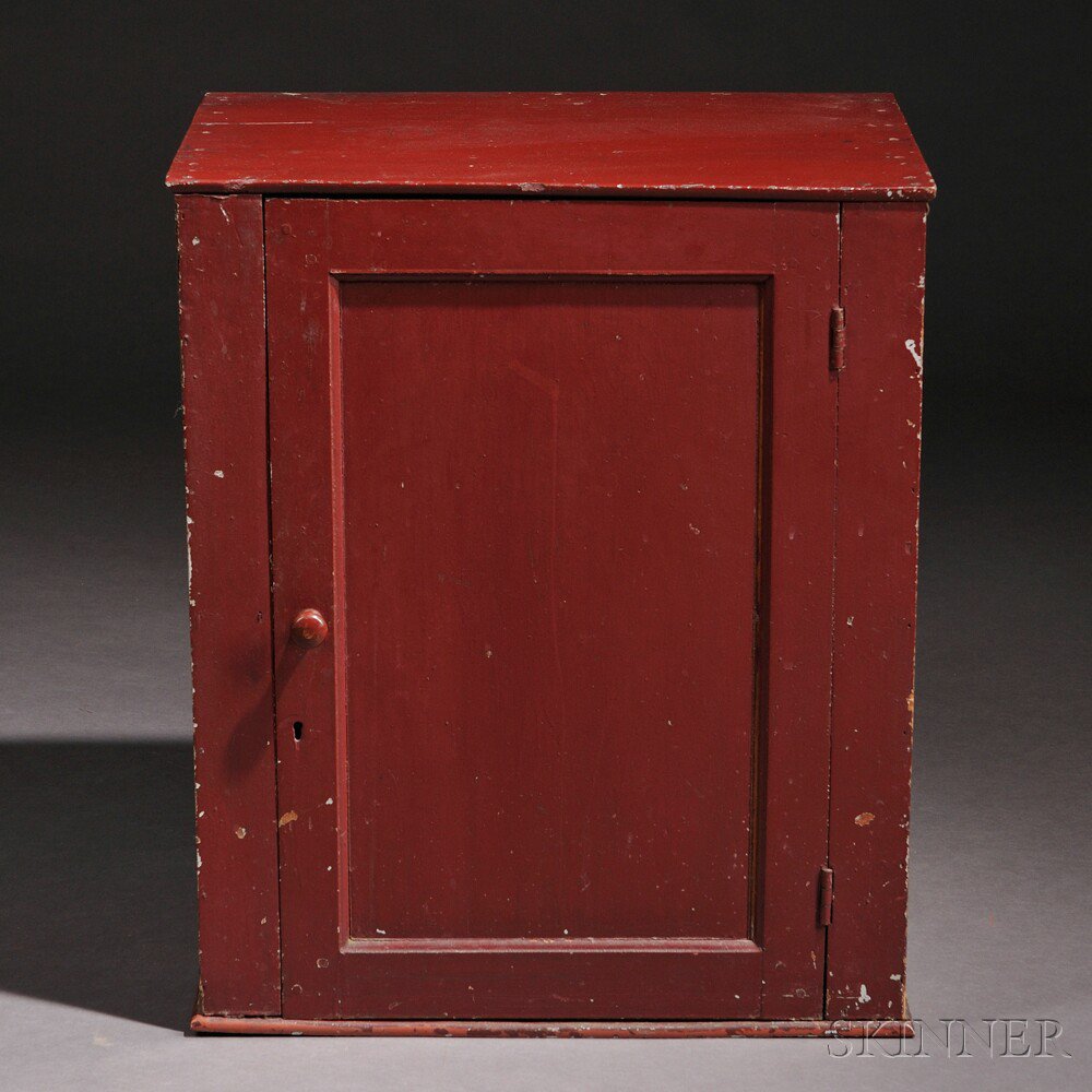 Appraisal: Shaker Red-painted Butternut and Pine Hanging Cupboard early th century