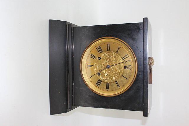 Appraisal: A TH CENTURY SLATE MANTEL CLOCK the brass dial with