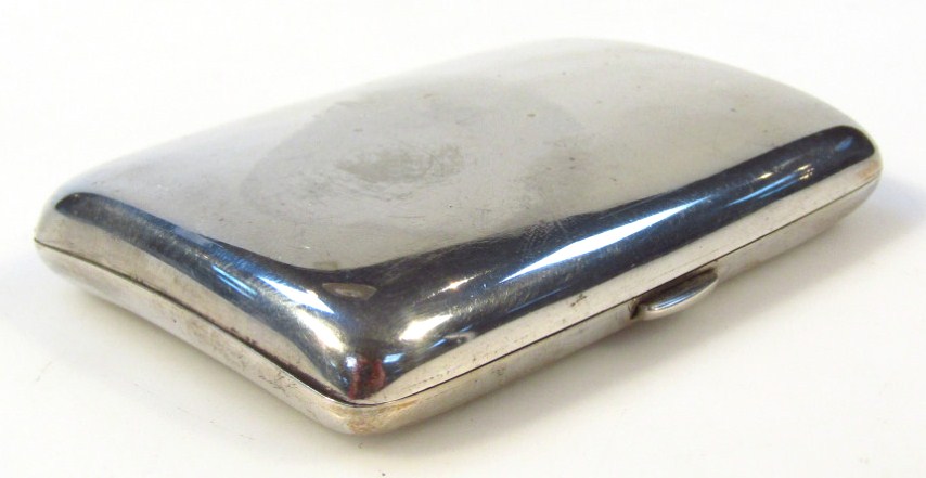 Appraisal: An Edwardian silver cigarette case with plain domed outer body