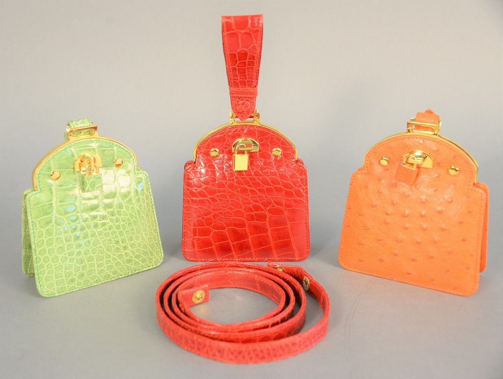 Appraisal: Three Giorgio's of Palm Beach clutch purses red green and