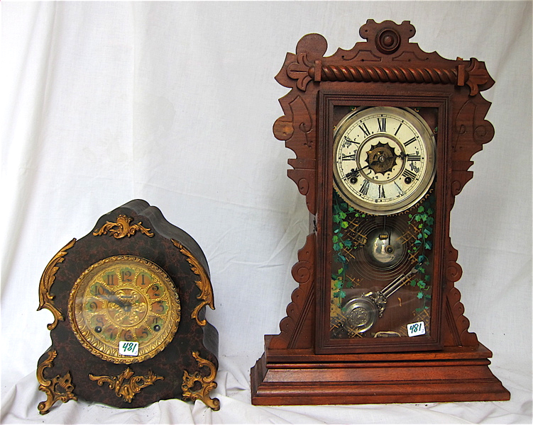 Appraisal: TWO AMERICAN ANTIQUE CLOCKS Waterbury kitchen clock with time strike