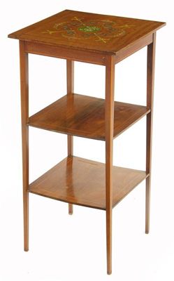 Appraisal: An Edwardian mahogany three tier etagere with stringing the top