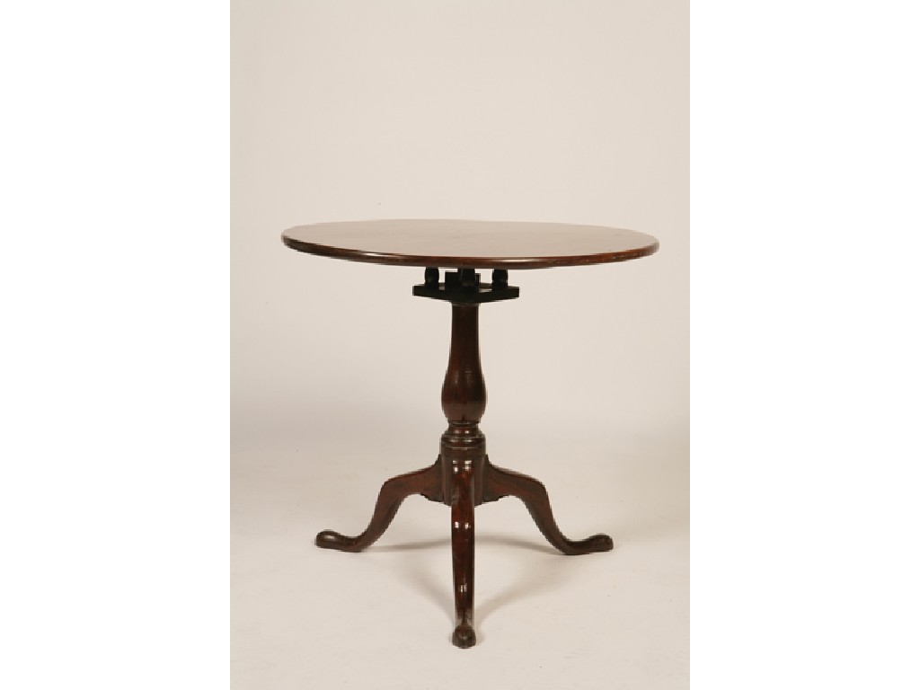 Appraisal: A GEORGE III MAHOGANY BIRD CAGE PILLAR TABLE the circular