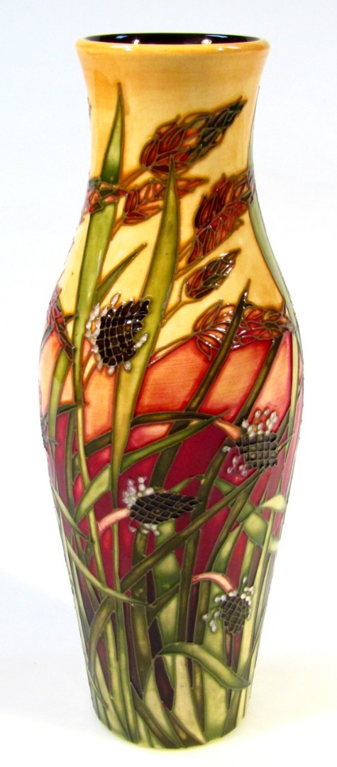 Appraisal: A Moorcroft pottery Savannah pattern vase by Emma Bossons of